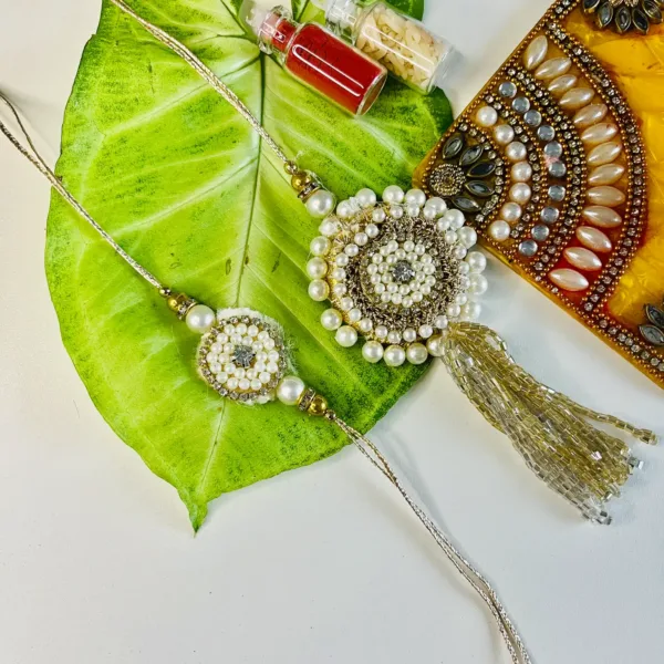 Elegant Pearl Pair Rakhi